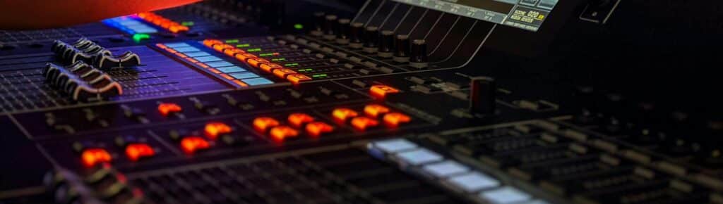 Picture of an audio mixing console being used for event production